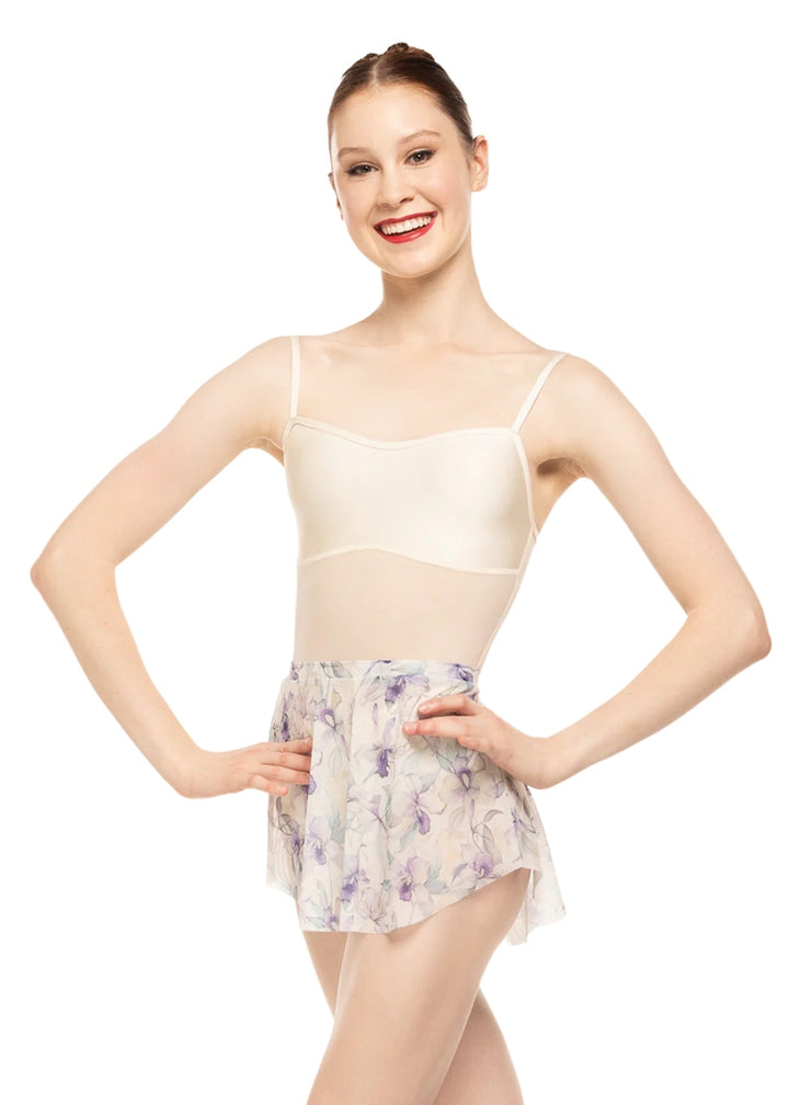 Eleve Dancewear Women's Calla Stretch Mesh Pull-On Skirt with tulip hemline and beautiful cream and purple floral print, shown on a ballet dancer