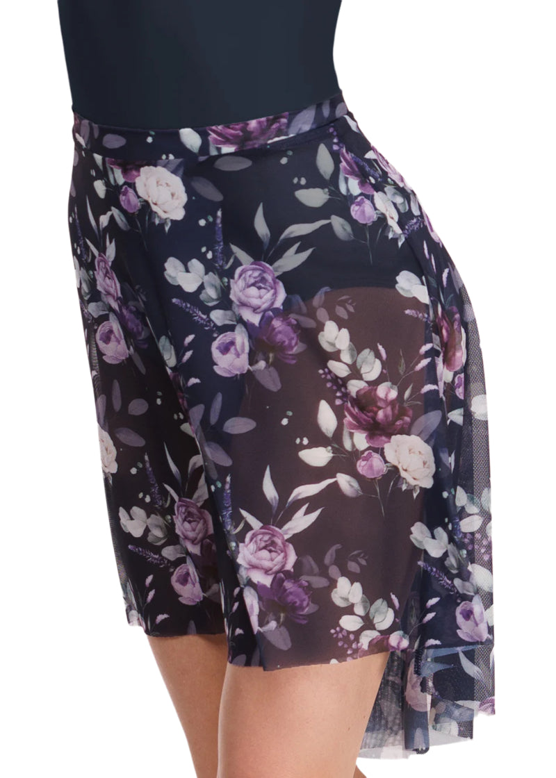 Eleve Dancewear Moonlit Garden Women's Back Tuck Floral Print Stretch Mesh High-Low Pull-On Ballet Skirt, shown on a ballet dancer in matching dark blue leotard