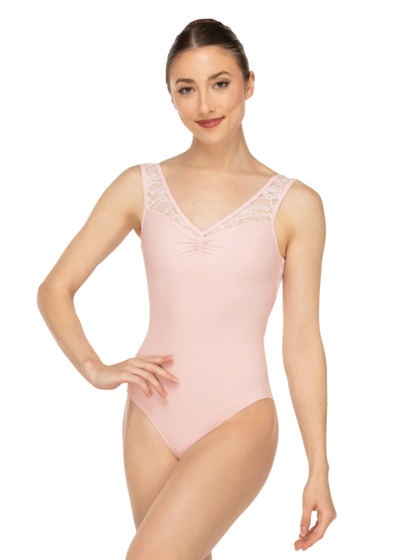 Eleve Dancewear Women's Fabiola Lace Pinch Front V-Neckline Tank Leotard with Back Lace Panels and Criss-Cross Low-Cut Back in Light Pink, shown on a ballet dancer