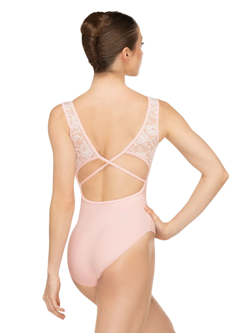 Eleve Dancewear Women's Fabiola Pinch Front V-Neckline Tank Leotard in Light Pink with Back Lace Panels in White and Criss-Cross Low-Cut Back in Light Pink, shown on a ballet dancer
