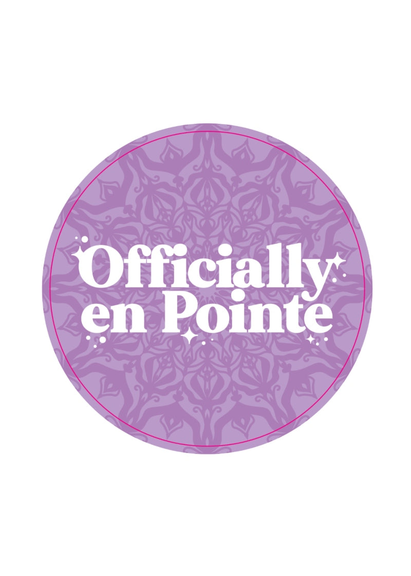 lavender pin with geometric pattern and the words "officially en pointe"