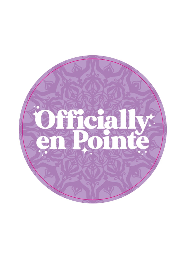 lavender pin with geometric pattern and the words "officially en pointe"