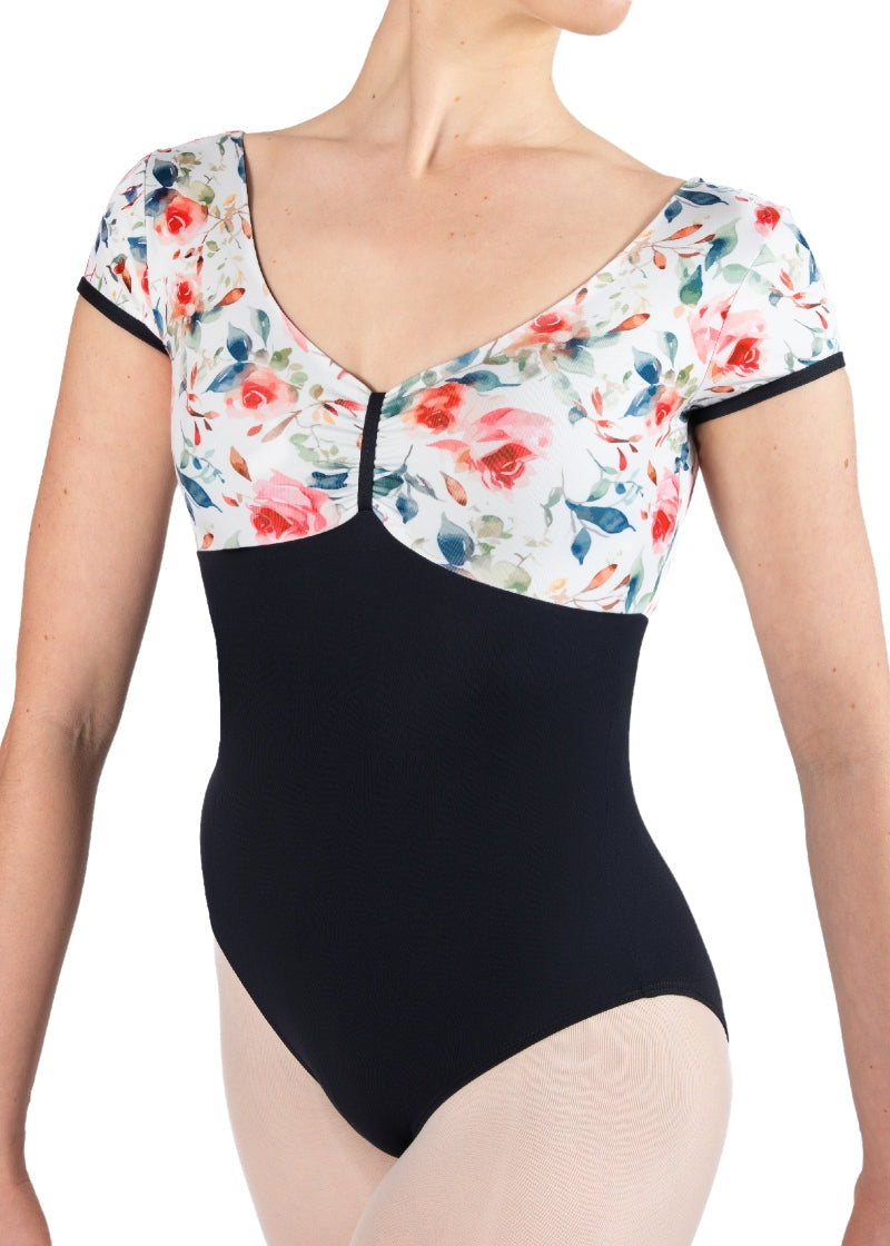 black cap sleeve leotard with white and floral bust