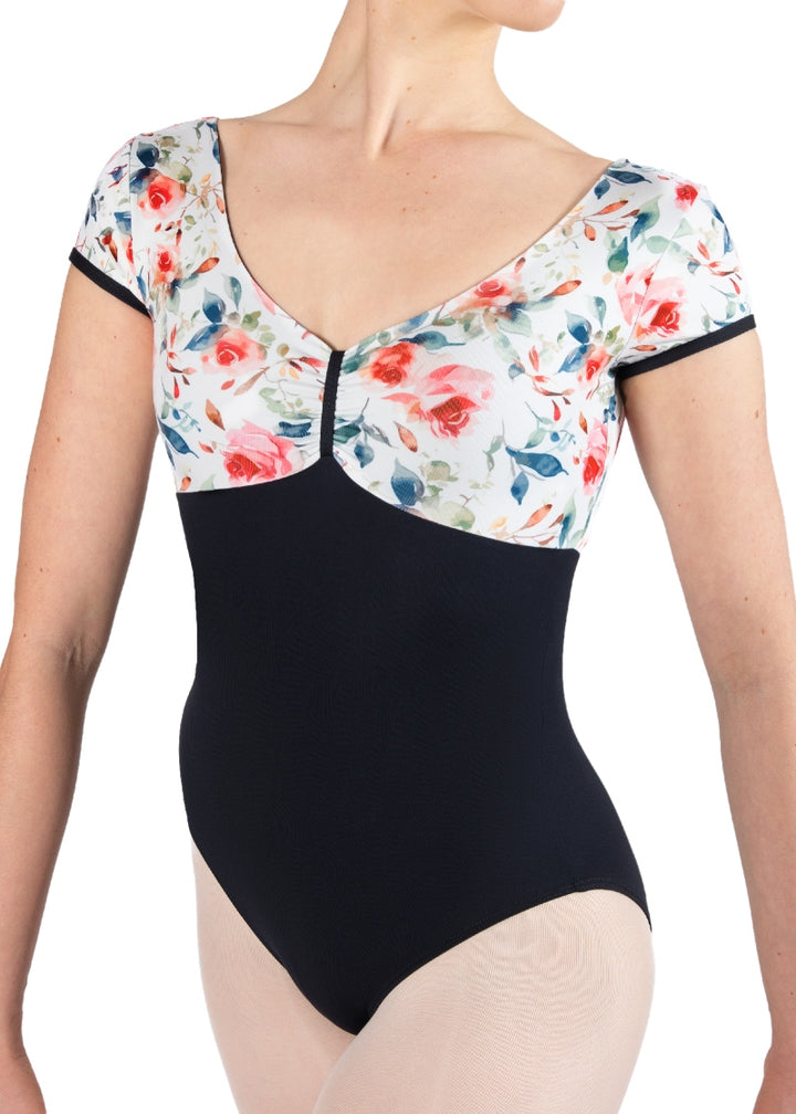 black cap sleeve leotard with white and floral bust