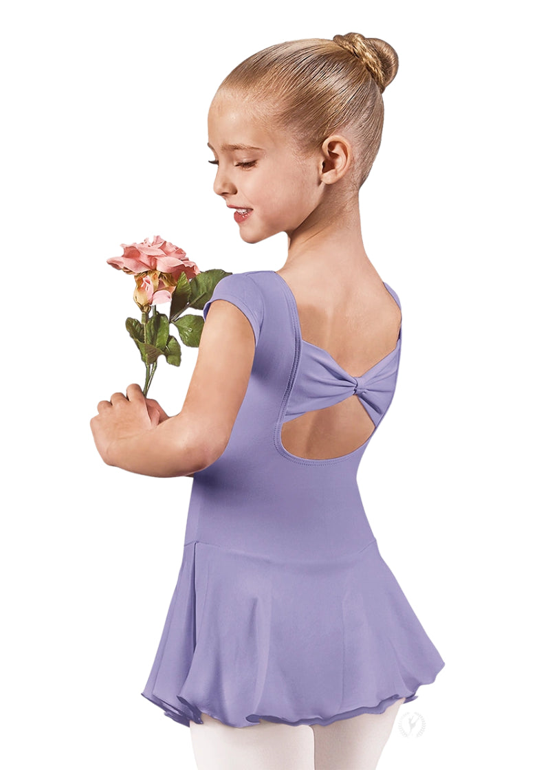 44285 Eurotard Girls Microfiber Bow Back Cap Sleeve Dance Dress in Lilac, shown from the back on an adorable young dancer holding a pink flower and looking over her left shoulder towards the viewer