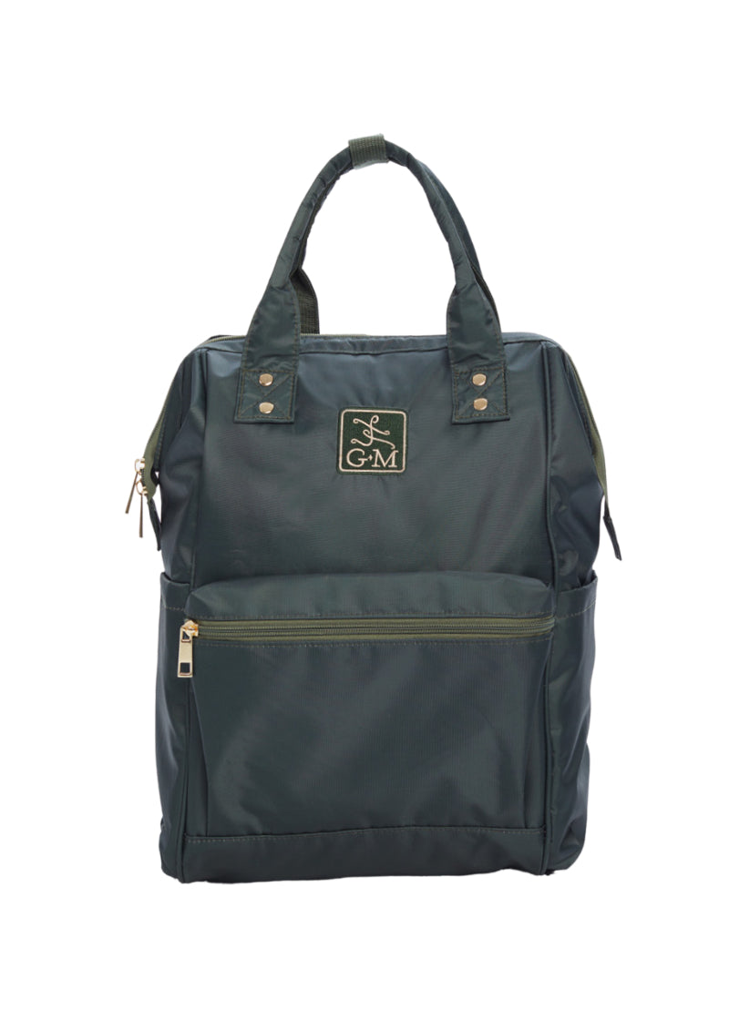 Gaynor Minden studio bag backpack in dark green.