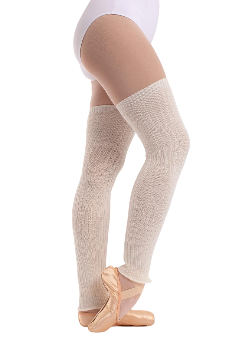 Intermezzo 2035 Women's Delphinia Knit Stretch Bamboo Mid-Thigh Fitted Ankle Legwarmers in Ivory White, shown on a ballet dancer wearing pointe shoes and a white leotard