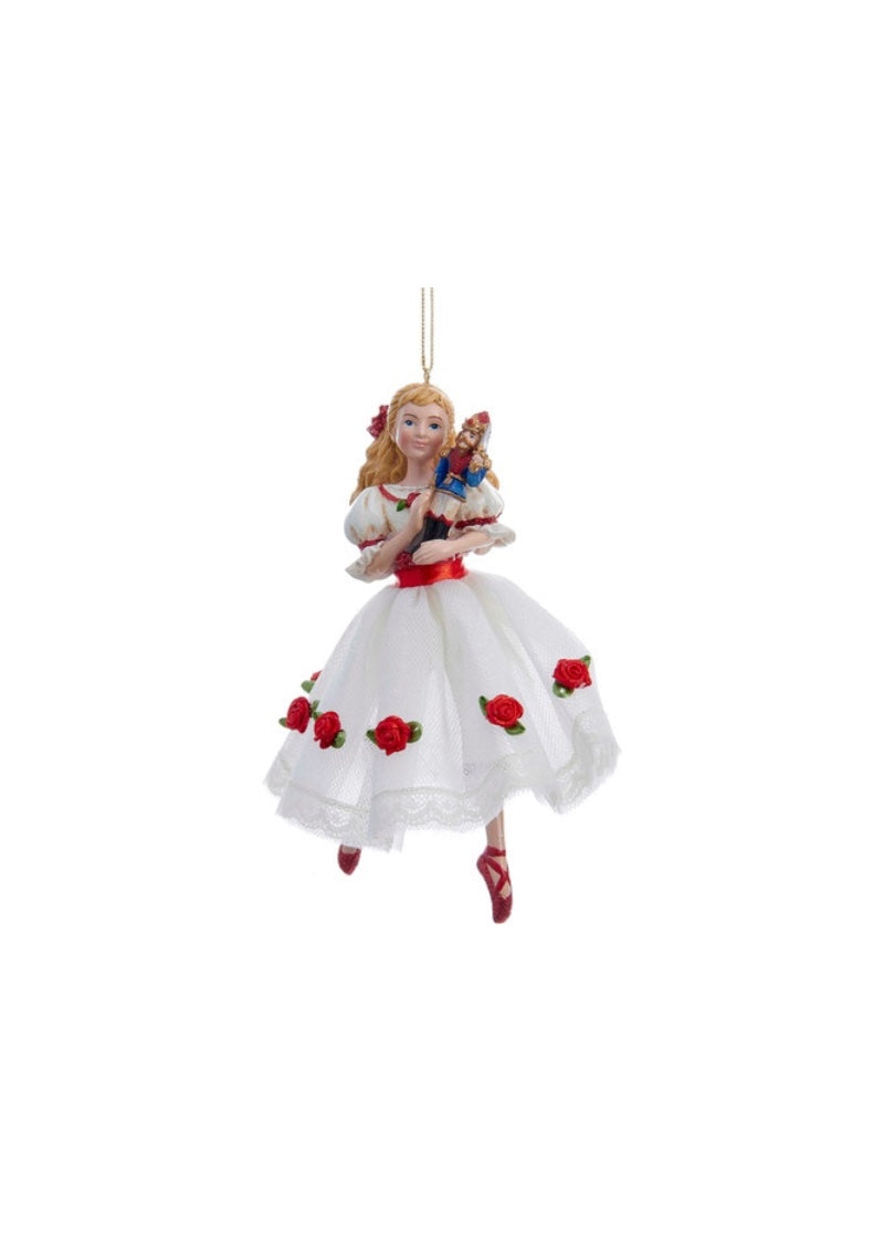 Kurt Adler holiday ornament Clara in white dress with roses and red pointe shoes, holding a nutcracker.