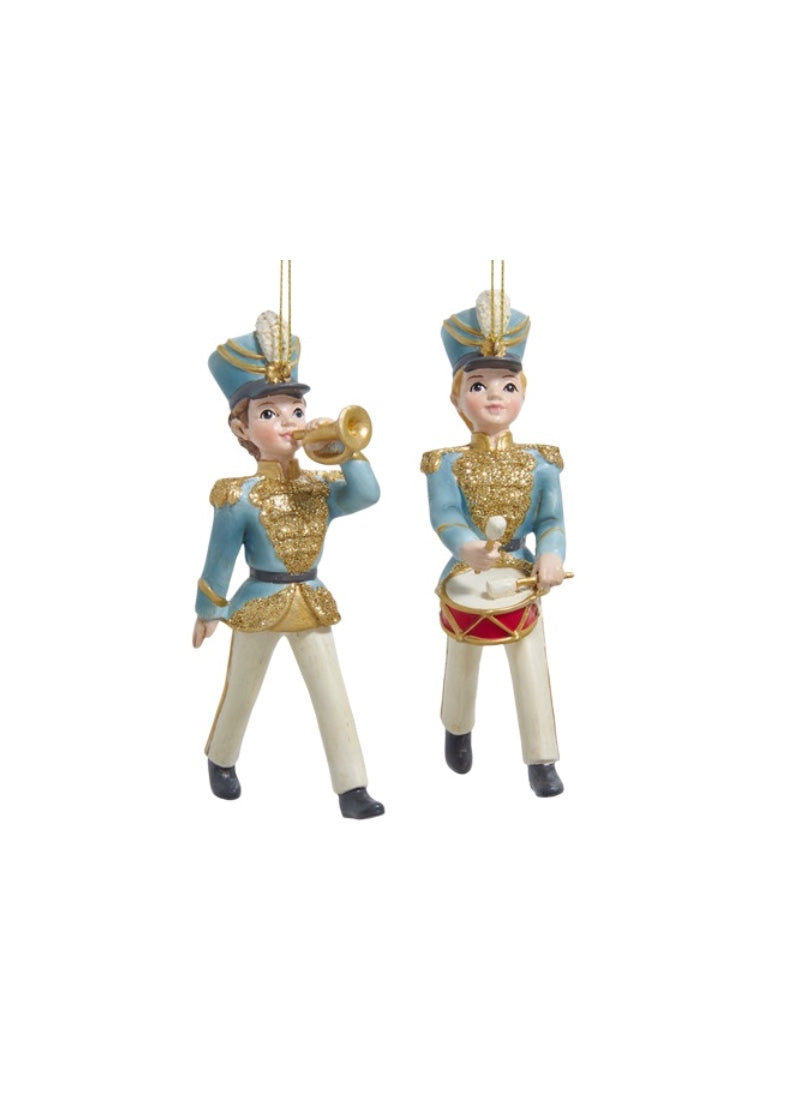 Two young soldier holiday ornaments marching with instruments.