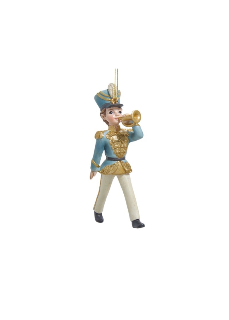 Young soldier holiday ornament marching and playing trumpet.