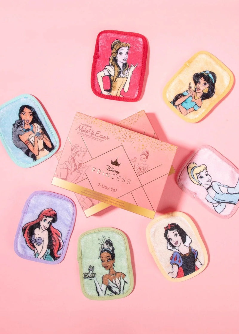 MakeUp Eraser Ultimate Disney Princess Seven Day Set featuring mini makeup erasers with on of each princess: Ariel, Belle, Cinderella, Jasmine, Pocahontas, Snow White, and Tiana, in a beautiful pink and gold gift box