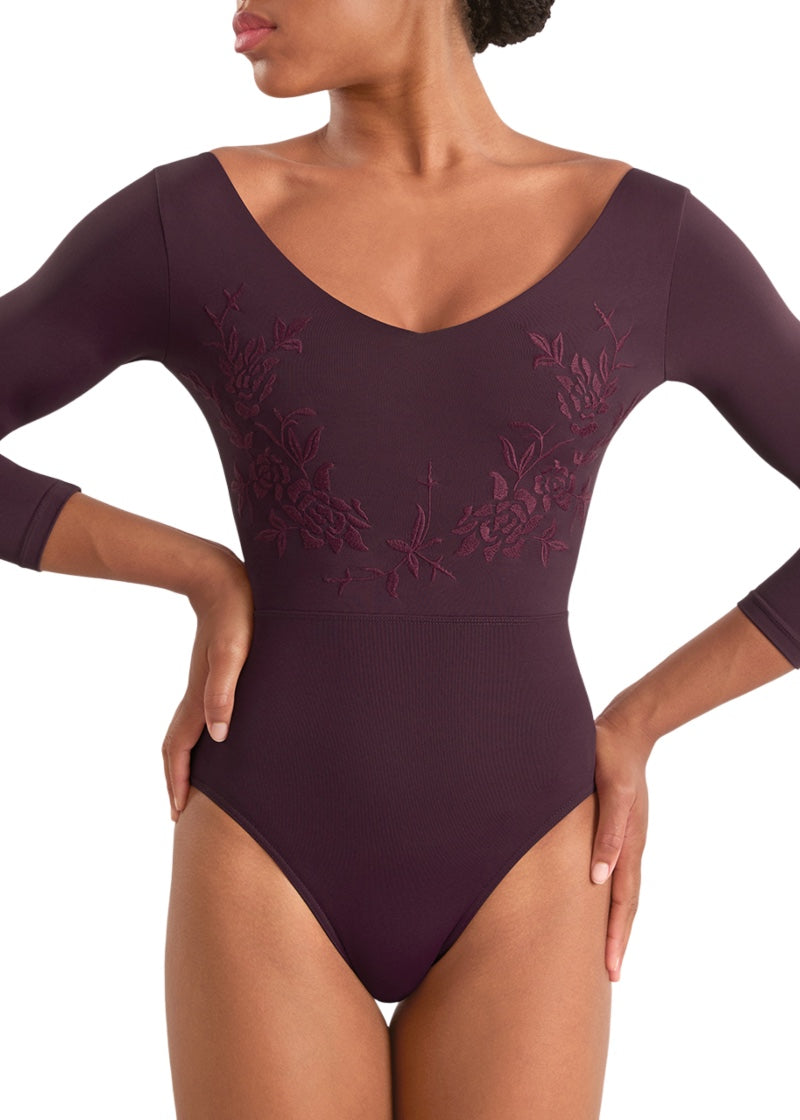 Mirella women's 3/4 sleeve leotard in burgundy with floral embroidery and v-neckline.