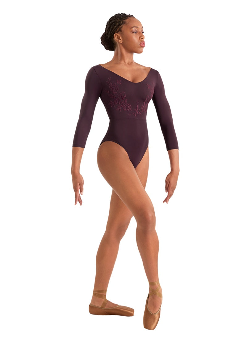 Mirella women's 3/4 sleeve leotard in burgundy with floral embroidery and v-neckline.