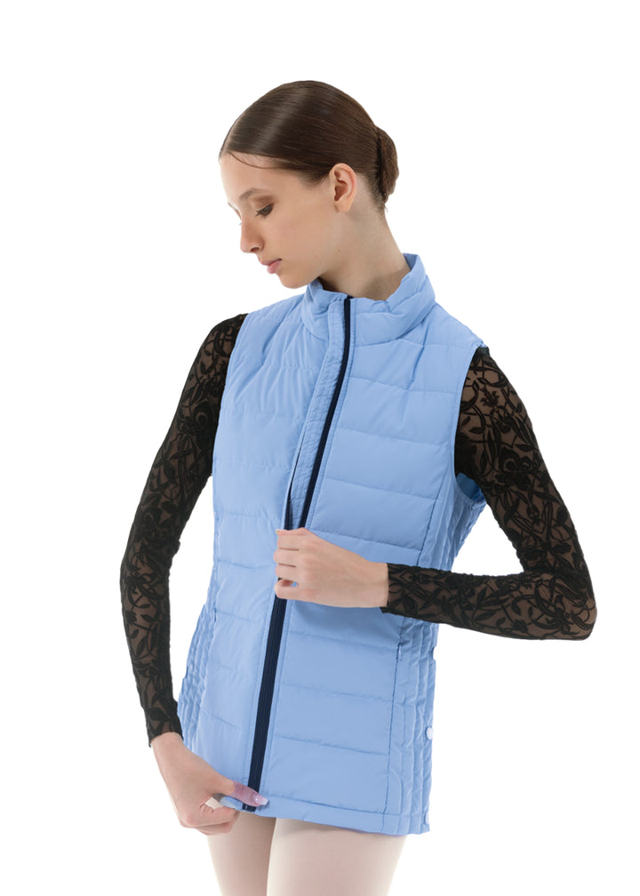 Nikolay women's Cloud puffy vest in light blue with black zipper.