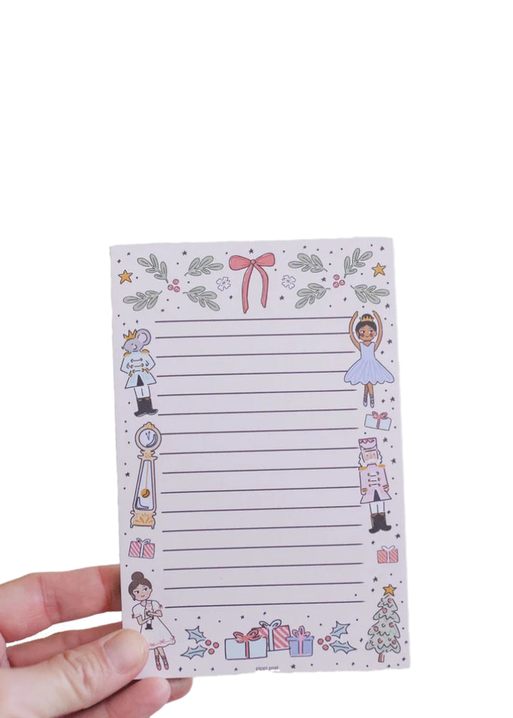 Pippi Post 480720 4"x6" 52 sheet lined paper notepad with cartoon Nutcracker characters and holiday decorations around border.