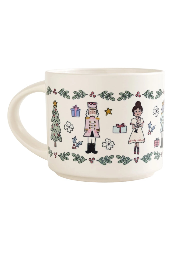 Ceramic mug with nutcracker art including Clara, the Nutcracker, and a Christmas tree.