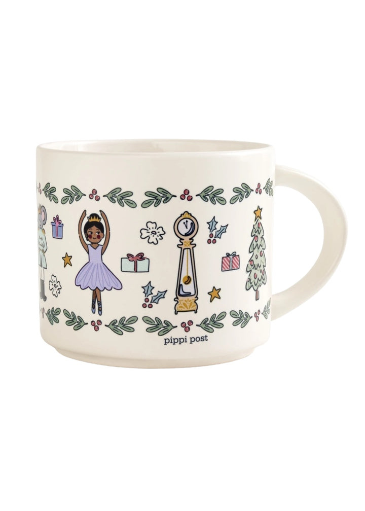 Ceramic mug with nutcracker art including the Sugar Plum Fairy, a grandfather clock, and a Christmas tree.