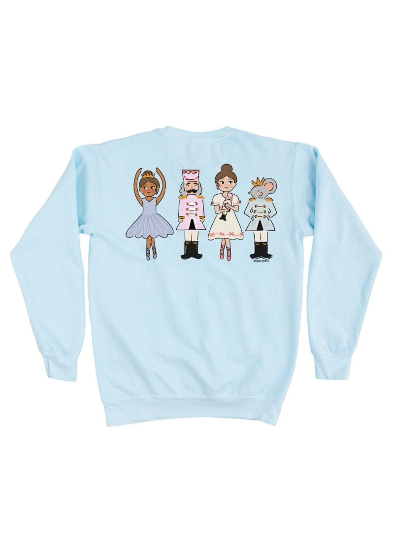 Light blue crew neck sweatshirt with cartoon nutcracker characters on the back.