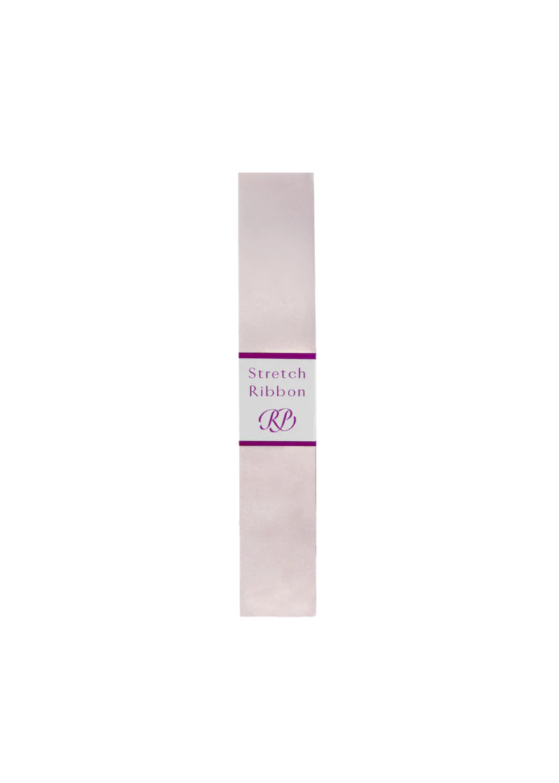 A 7/8" by 2.5 yard package of RP Stretch Pointe Shoe Ribbon in RP Pink
