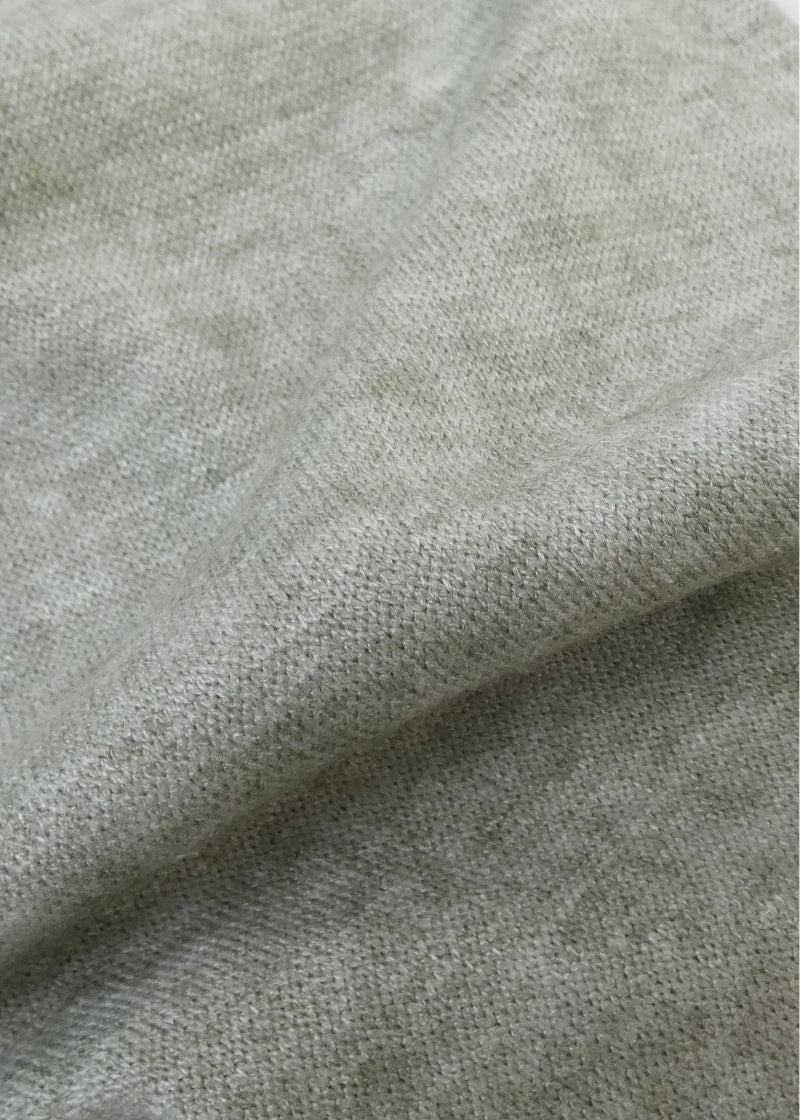 close-up view of RubiaWear Morning sage green soft knit fabric