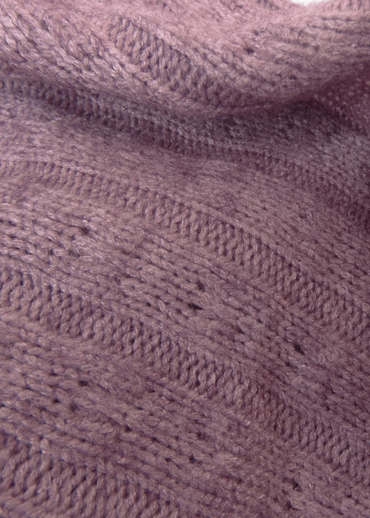 close-up view of RubiaWear Rosewater dusty pink cable knit fabric