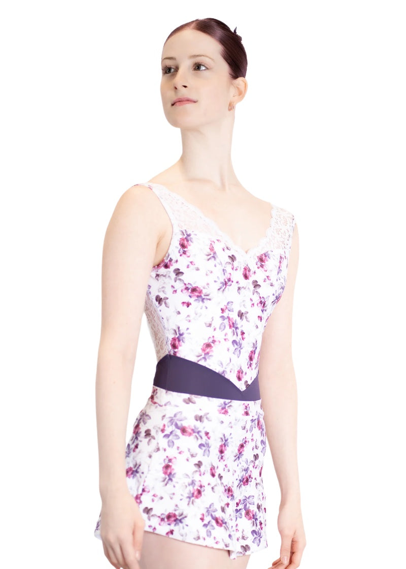 White short pull-on skirt with pink and purple floral print.