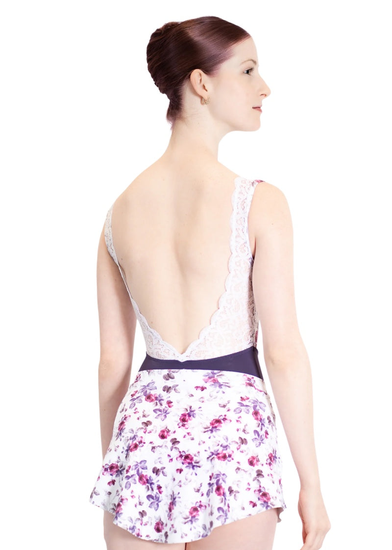 White short pull-on skirt with pink and purple floral print.