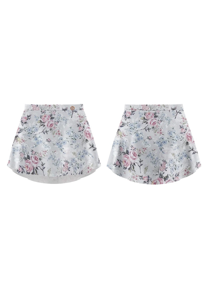 White pull-on short skirt with pink and blue floral print.