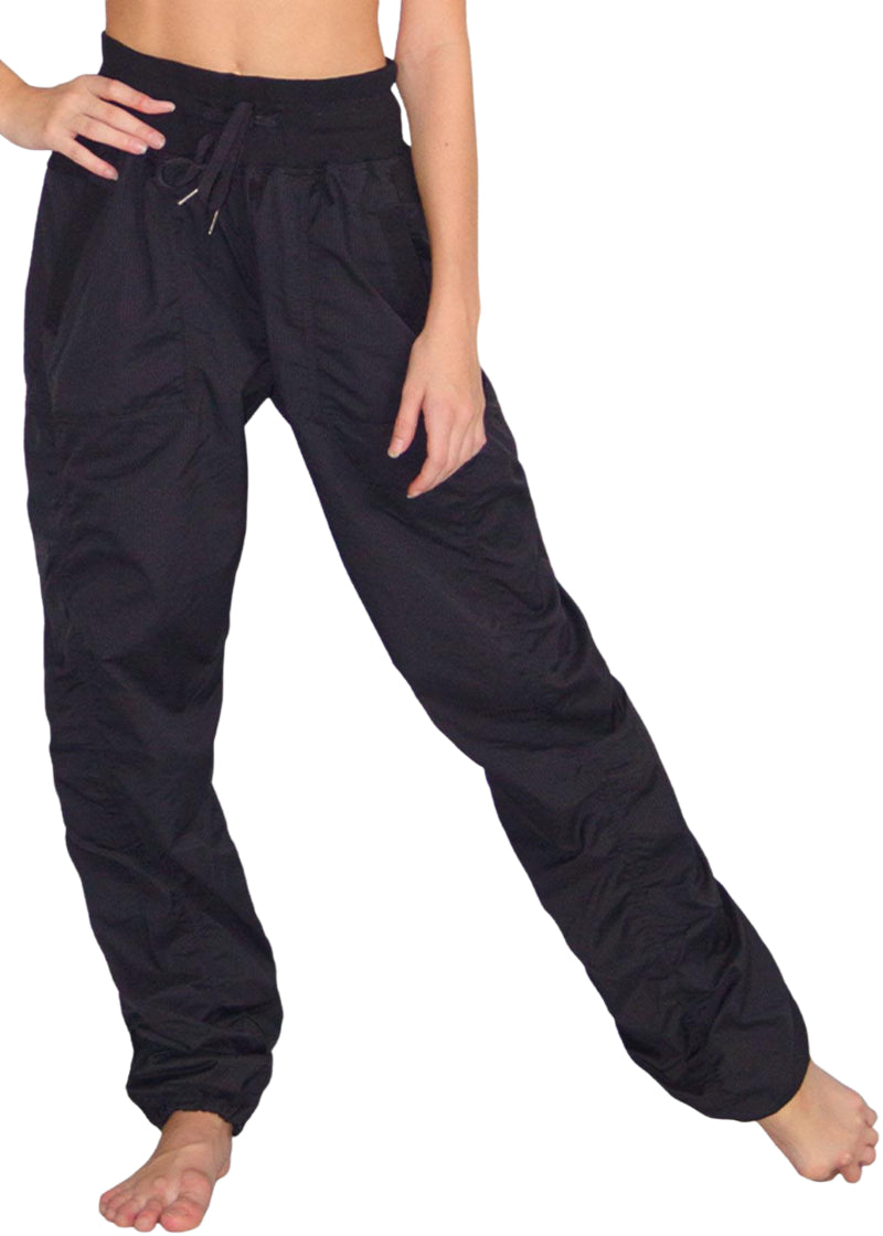 So Danca SP01 Women's lightweight and stretchy Studio Pants in Black with wide drawstring waistband and hem drawcords for a fully customizable fit, shown on a dancer