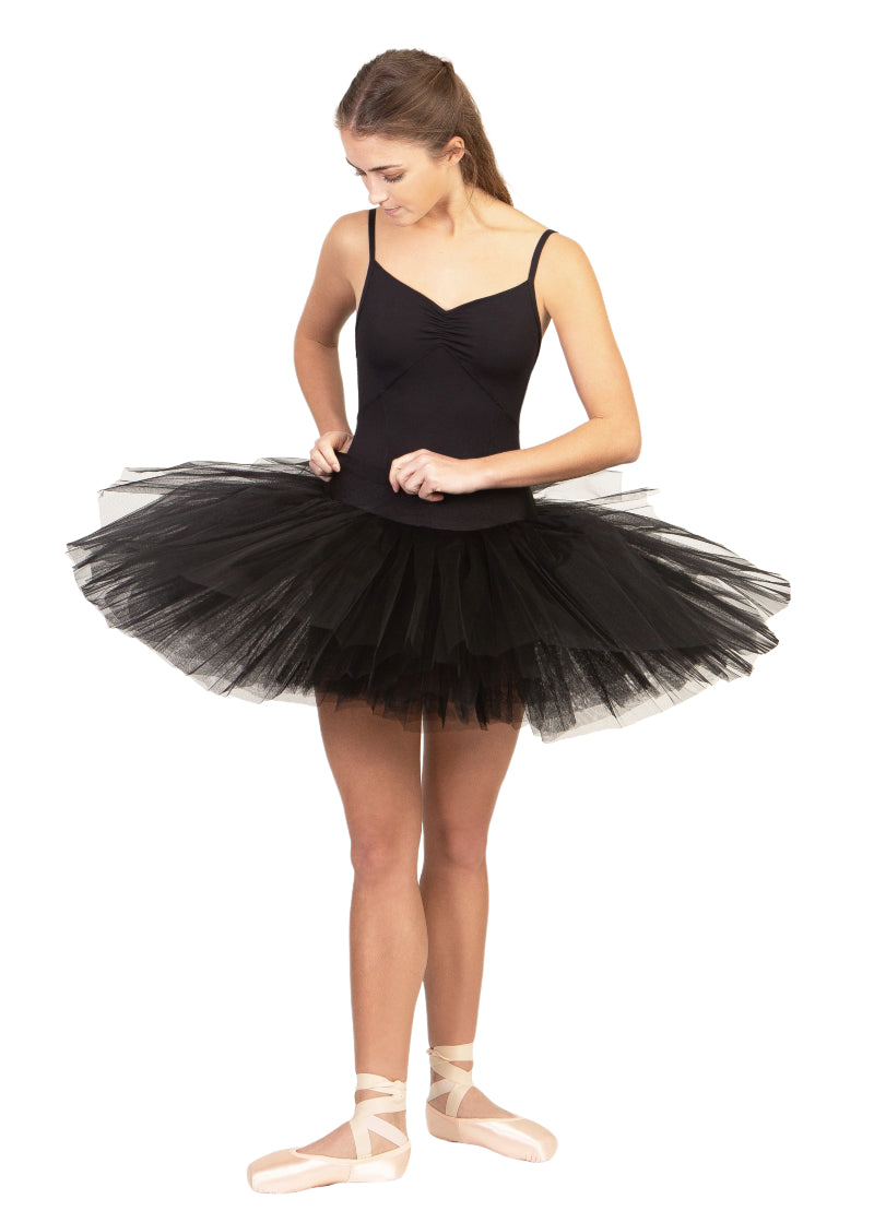 Suffolk 1012A Women's Practice Platter Tutu in Black, shown on a ballerina adjusting the stretch waistband