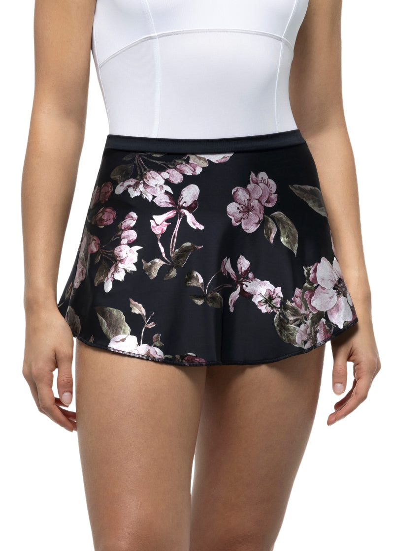 Suffolk women's high-low pull-on skirt in shiny floral print with black background.