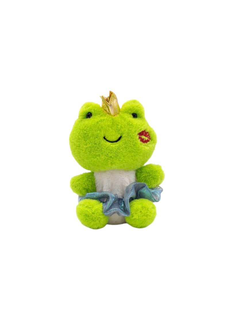 Dasha green plush frog with white stomach, blue scrunchy tutu, gold crown, and red embroidered kiss mark on its cheek.
