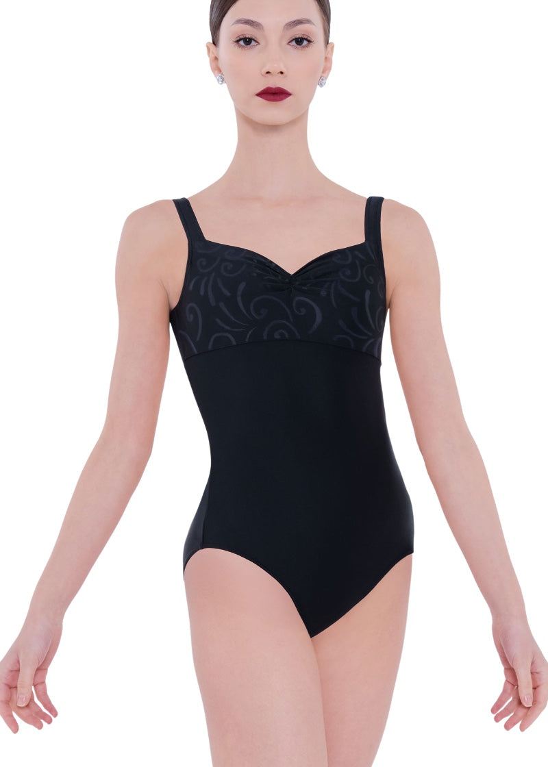 Wear Moi women's Fereni tank leotard in black with pinch front neckline, empire waistline, and black swirl patterned bust.