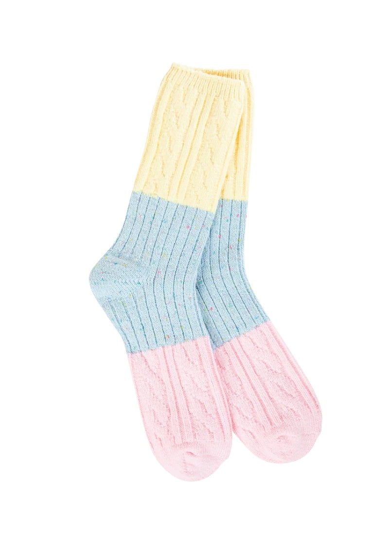 cable knit color blocked socks in pink, blue, and yellow