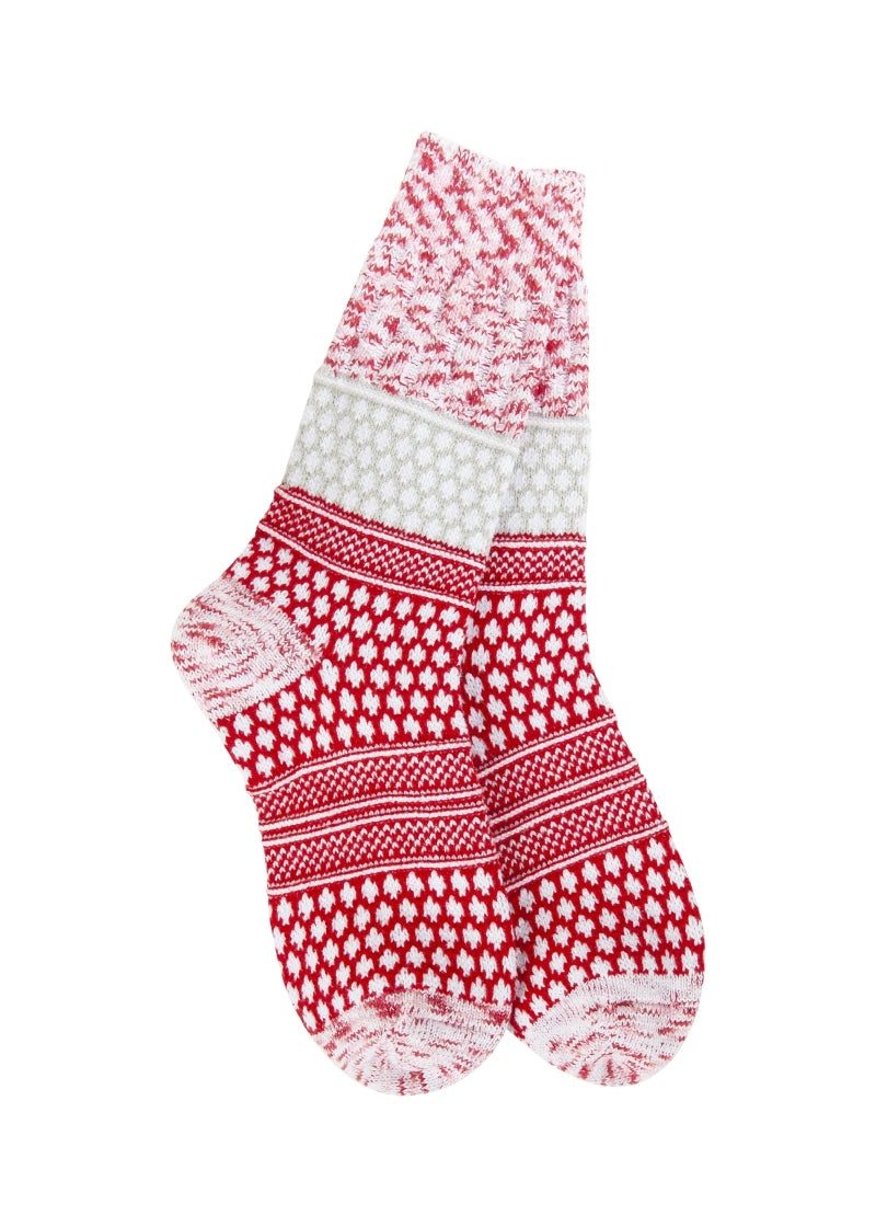 red knit socks with white geometric pattern