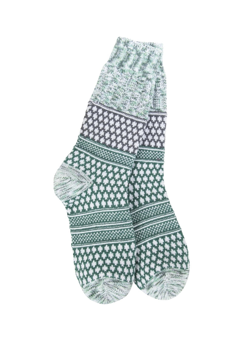 green knit socks with white geometric pattern