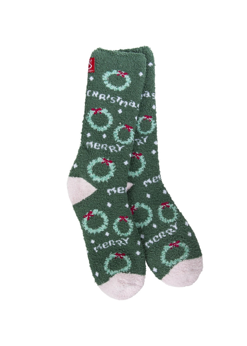 green fuzzy socks with wreath pattern