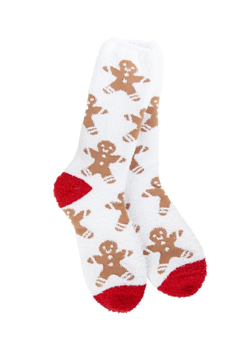 white fuzzy socks with gingerbread man pattern and red accents