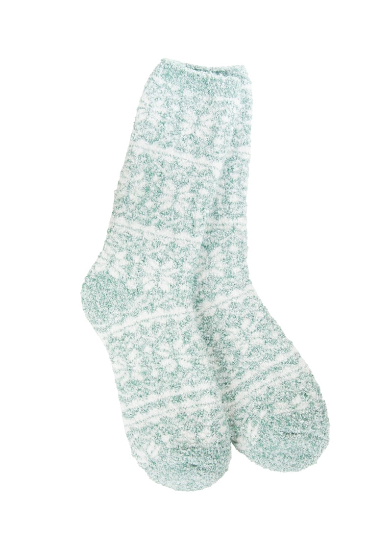 mint green fuzzy socks with white geometric pattern