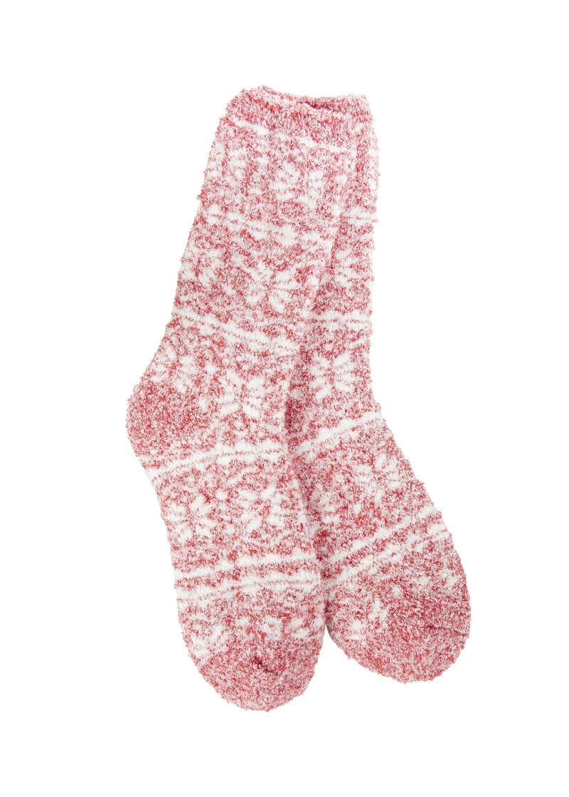 red fuzzy socks with white geometric pattern