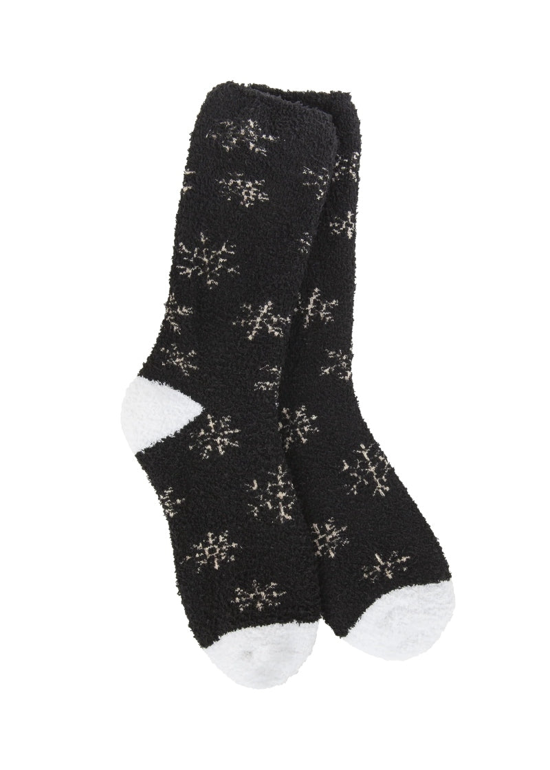 black fuzzy socks with silver snowflake pattern and white accents