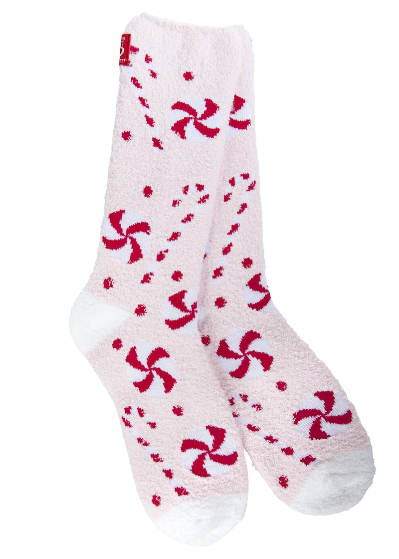 Worlds Softest Peppermint Lane Cozy Crew Socks, super soft fuzzy socks featuring a festive pattern of red and white peppermint candies and candy canes on a light pink and white background