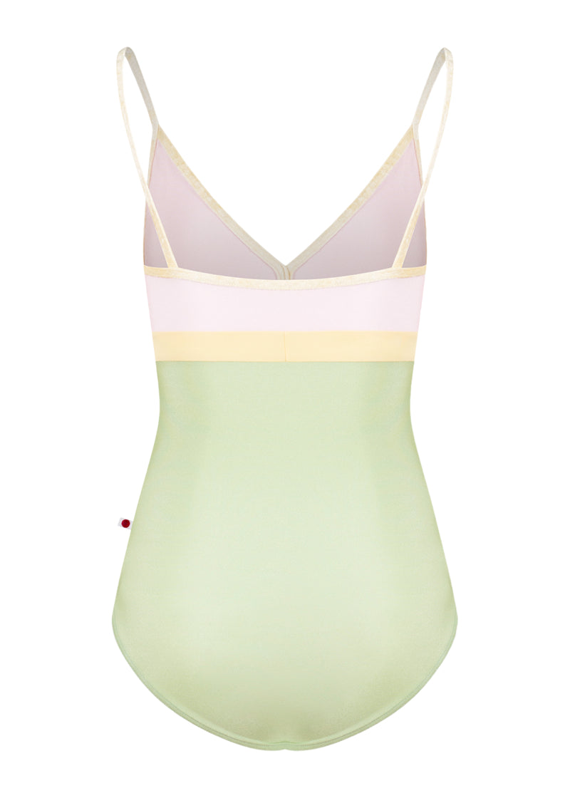 Yumiko women's Zoe camisole leotard with light green bottom, light pink top, and yellow trim, straps, and waistband.
