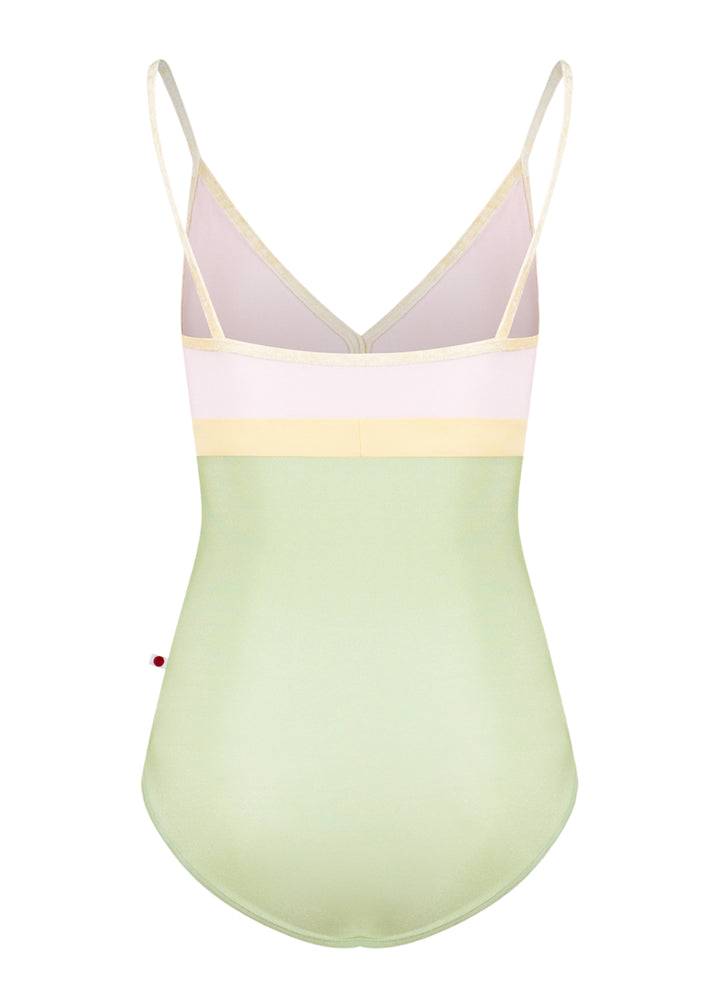 Yumiko women's Zoe camisole leotard with light green bottom, light pink top, and yellow trim, straps, and waistband.