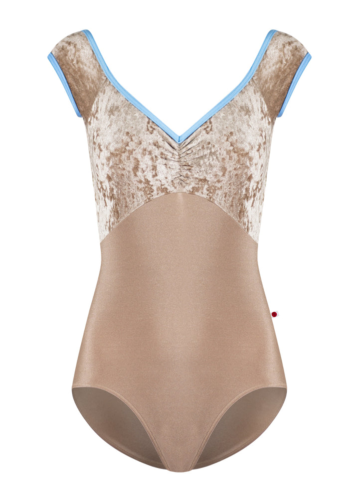 Yumiko Elli cap sleeve leotard in tan, with crushed velvet bodice and light blue trim.