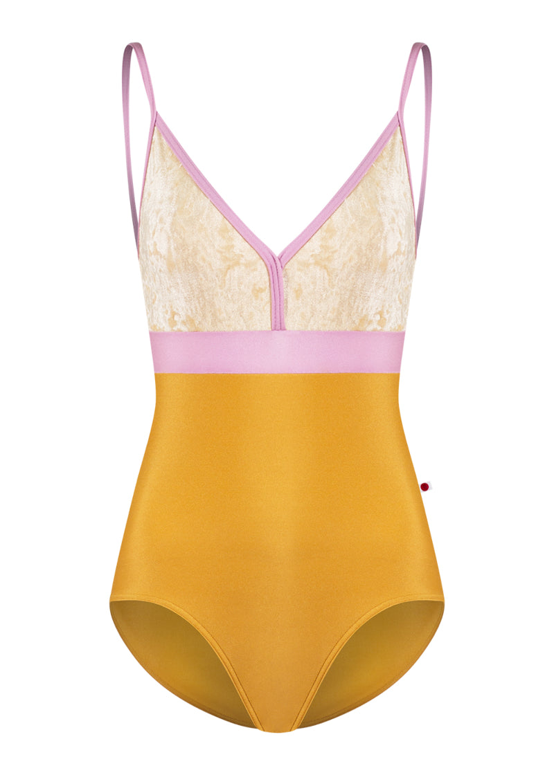 Yumiko Zoe camisole leotard with yellow bottom, cream crushed velvet top, and pink waistband and trim/straps.